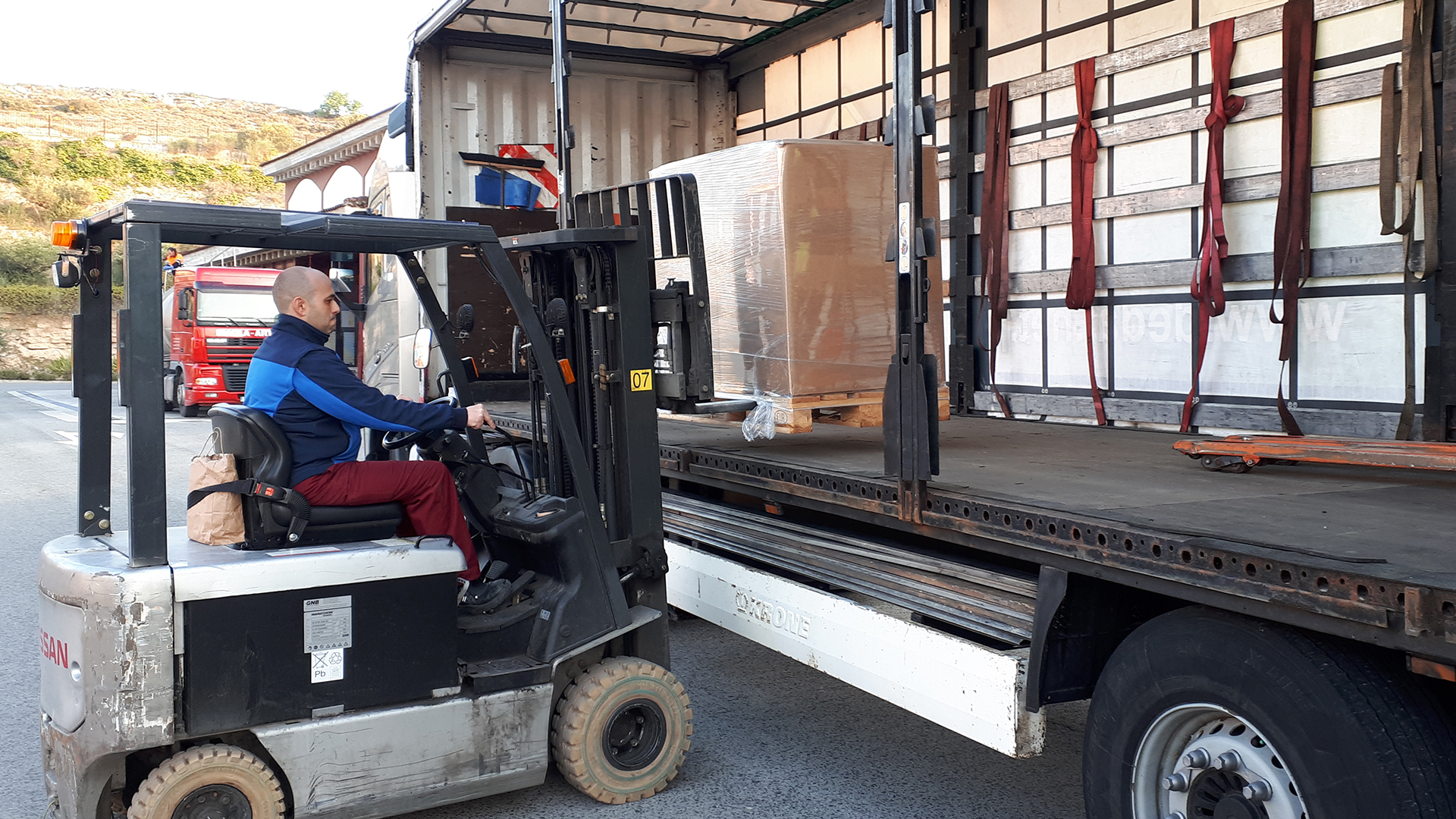 Man collecting label liner waste